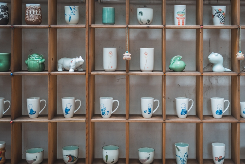 Ceramic Collection on Wooden Shelves