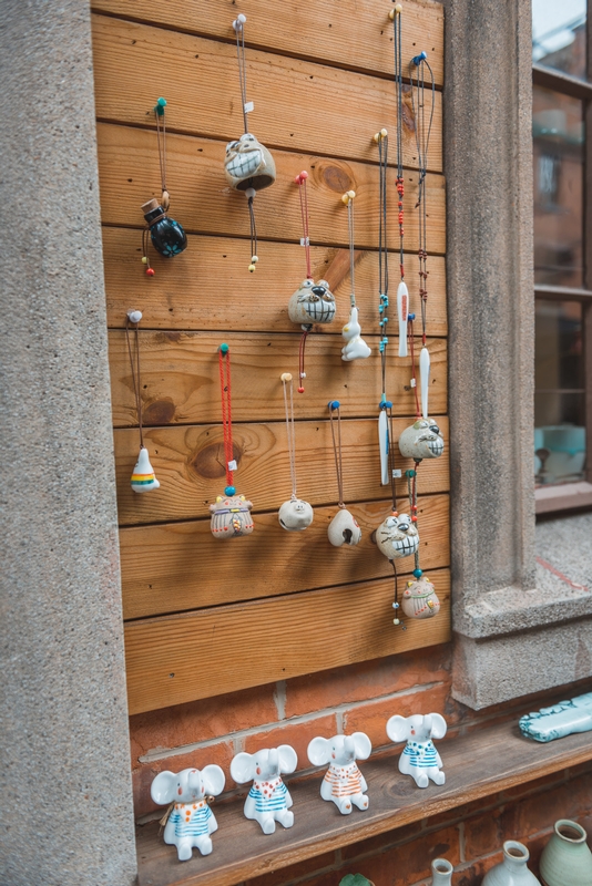 Ceramic Ornaments on Pegboard Display