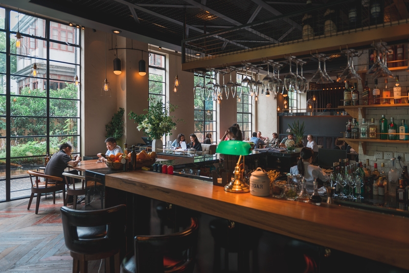 Industrial Café With Wooden Bar and Pendant Lights
