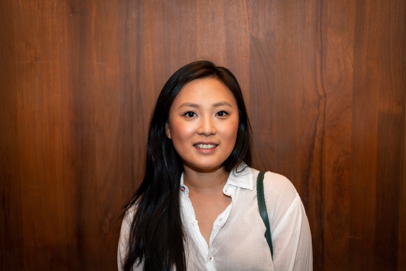 Professional Portrait Against Wood Paneling