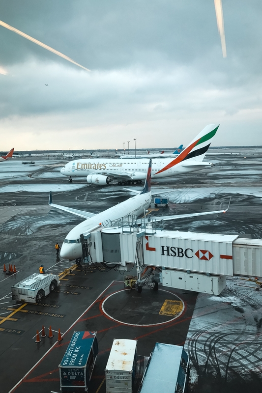 Emirates Aircraft at Gate With HSBC Bridge