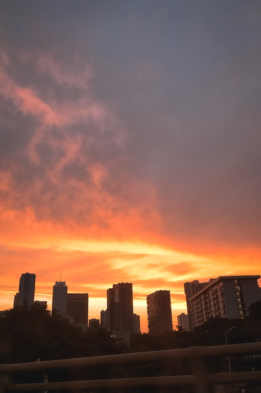 Sunset Over Urban Skyline