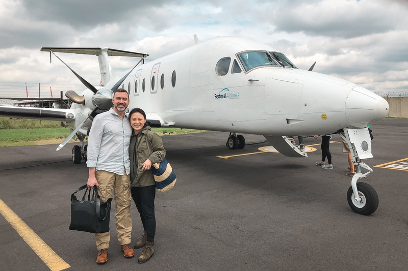 Couple Boarding Regional Aircraft