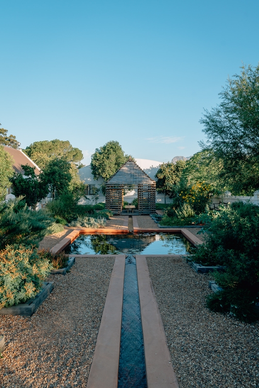 Symmetrical Garden Pathway to Wooden Pergola