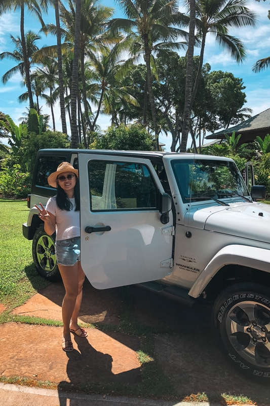 Woman With Jeep in Tropical Paradise