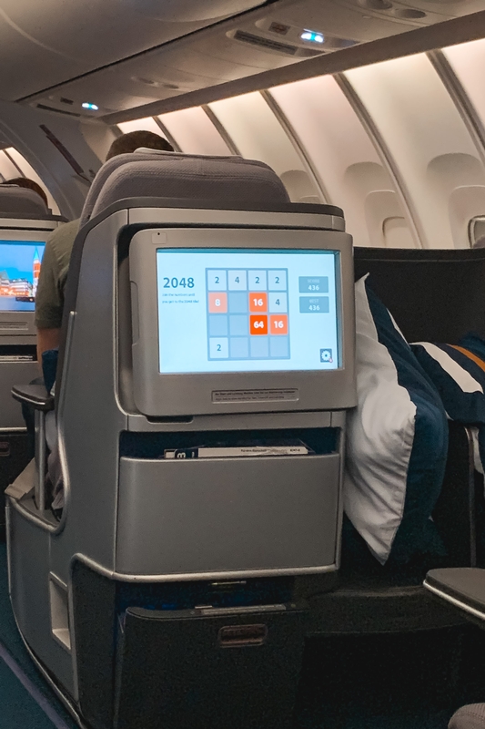 Passenger Playing 2048 Game Inflight