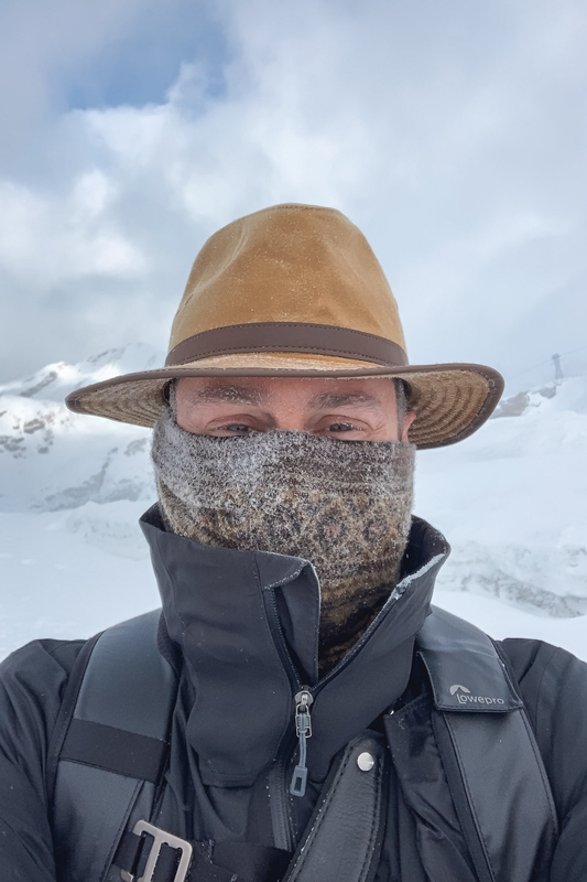 Mountaineer in Frosted Alpine Conditions