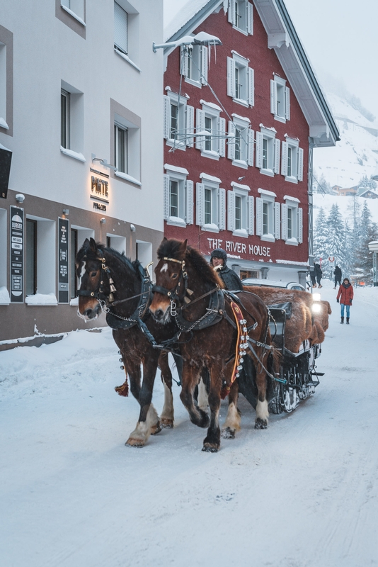 Horse-Drawn Carriage Through Andermatt