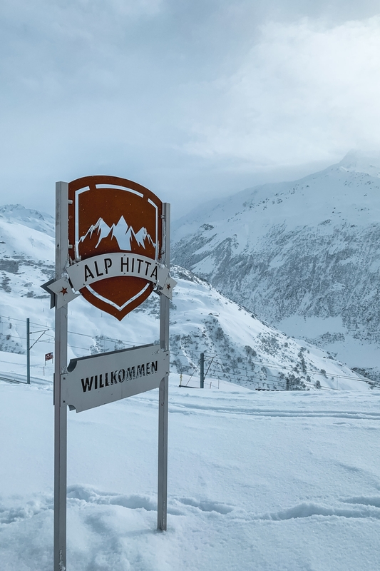 Alp Hitta Welcome Sign in Alpine Snow