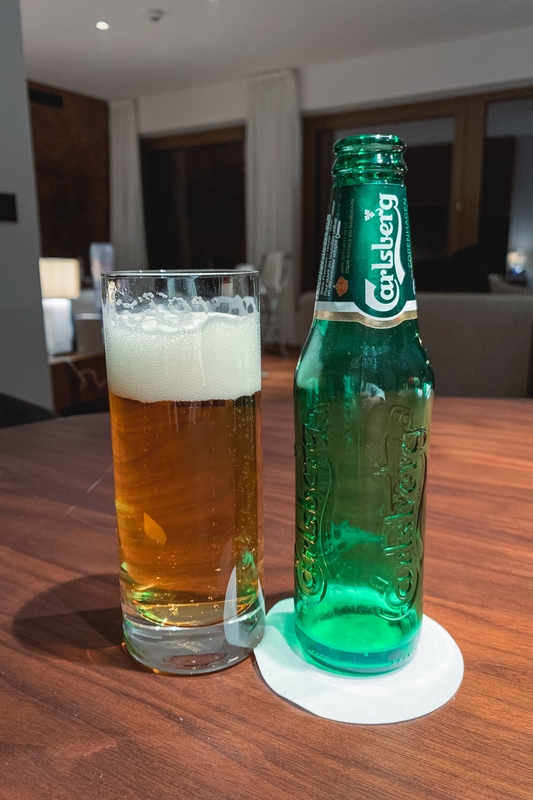 Carlsberg Beer and Glass on Wood