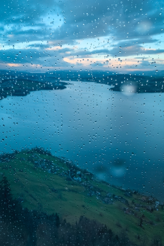 Raindrops Frame Misty Alpine Lake