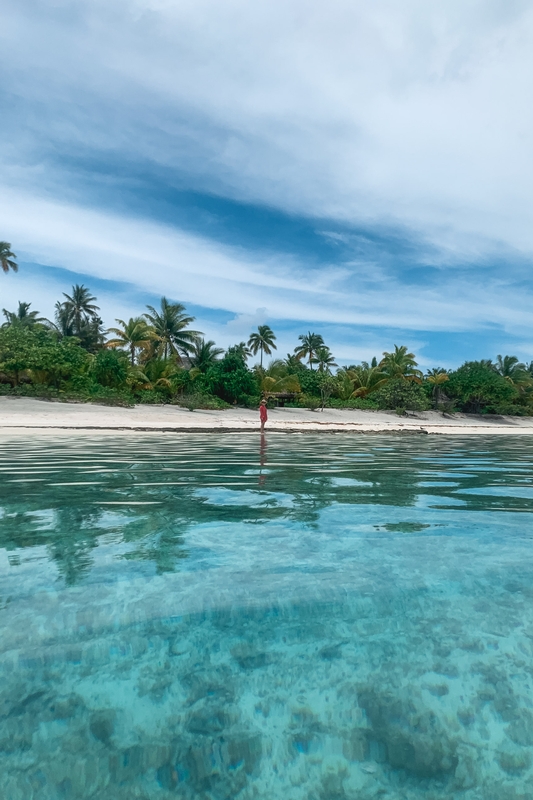 Solitary Figure in Tropical Waters