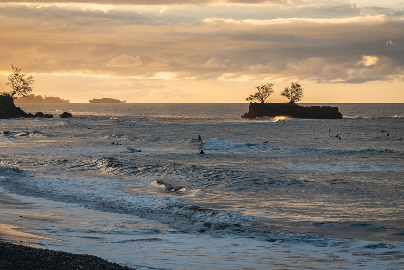 Surfing the Black Sand Beaches of Tahiti