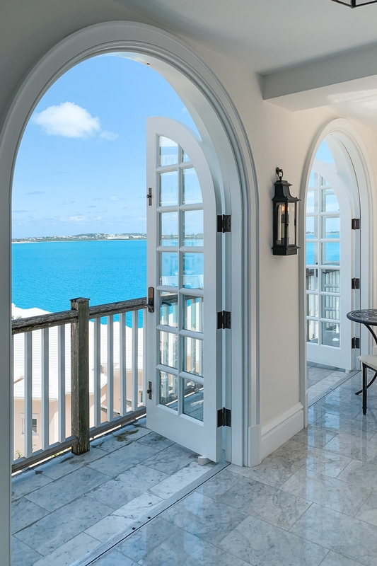 Turquoise Ocean View Through Arched Doors