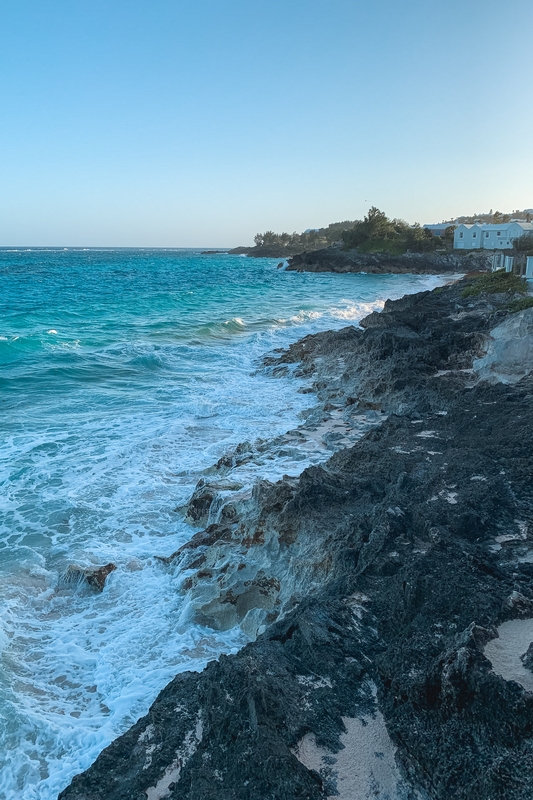 Turquoise Waves and Coastal Blue Cottage
