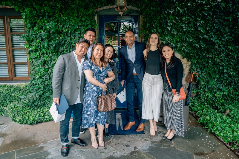 Elegant Group At Ivy-Covered Blue Door