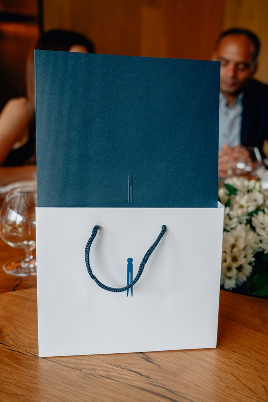 Luxury Shopping Bag at Fine Dining Event