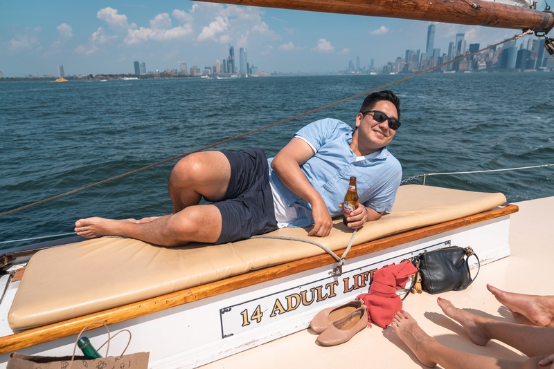 Man With Beer on Manhattan-Bound Sailboat