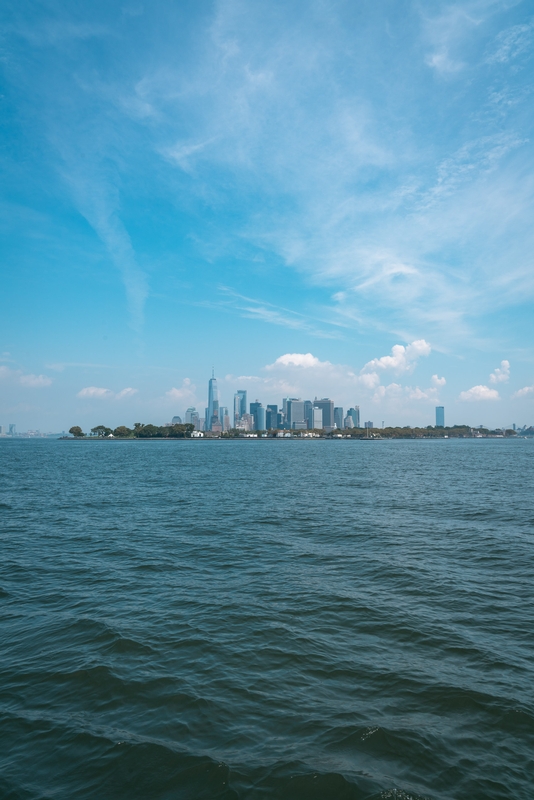 Manhattan Skyline Across Calm Waters