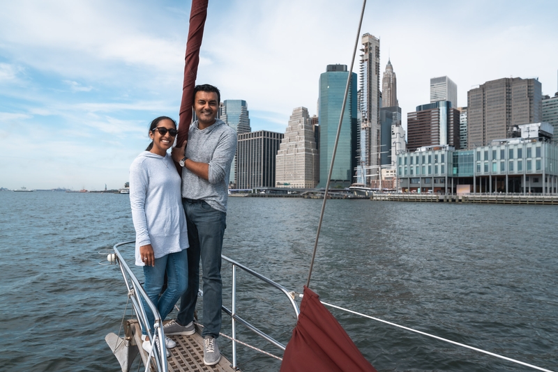 Couple on Sailboat With Manhattan Skyline