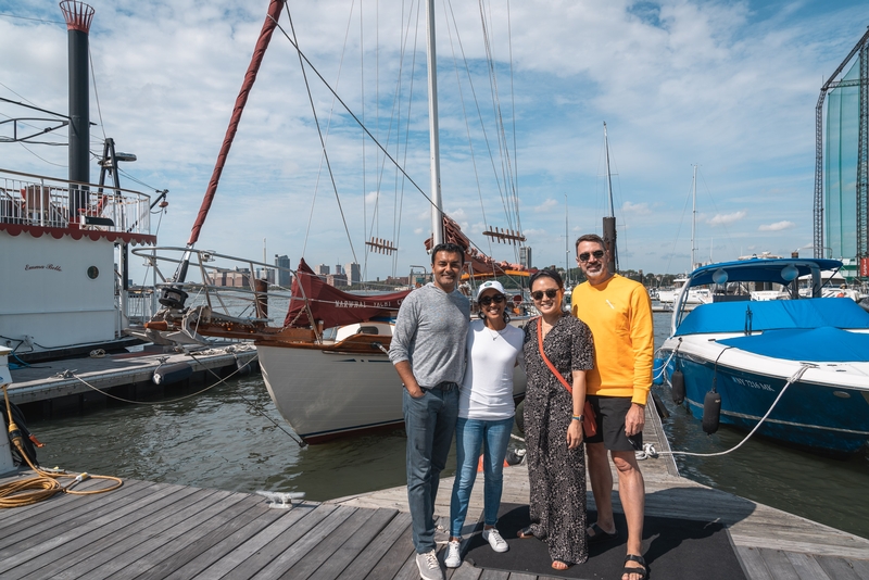 Group On Dock With Historic Sailships