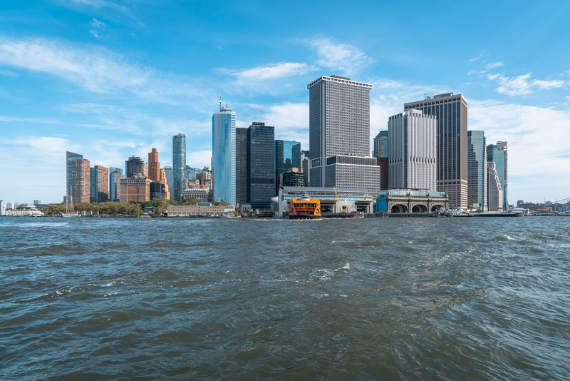 Manhattan Skyline With Yellow Ferry