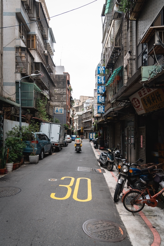 Narrow Taipei Alley With Motorcycles