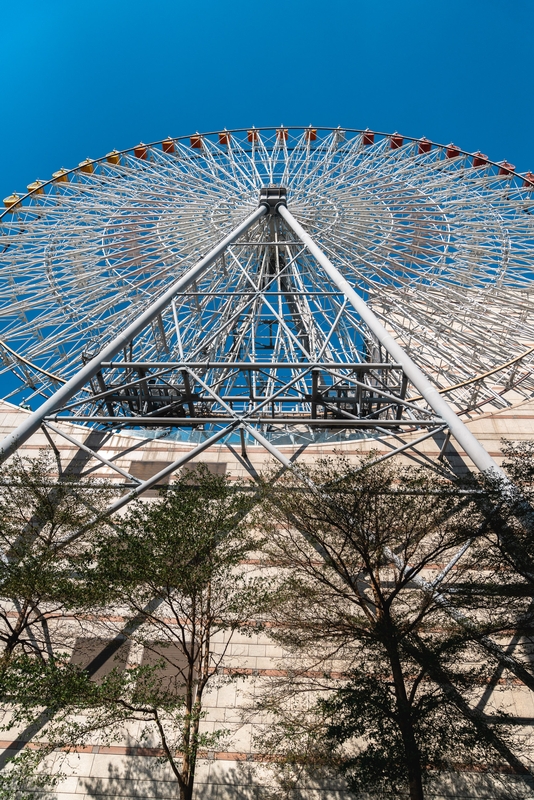 Ferris Wheel Against Blue Sky