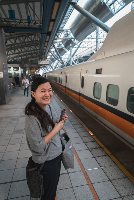 Woman With Ticket at Modern Train Station