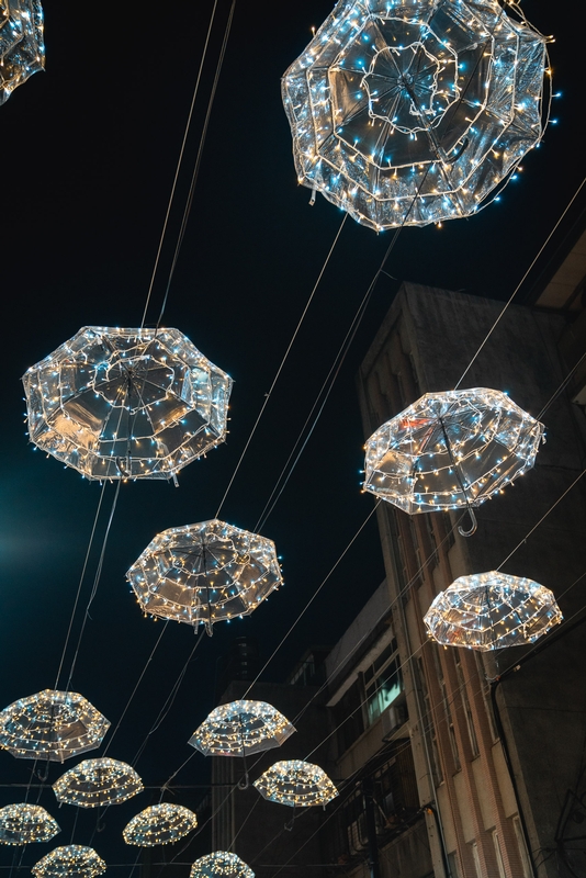 Illuminated Umbrellas Suspended Over Taipei Street