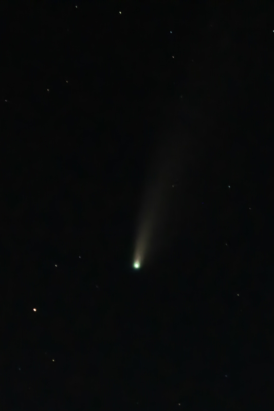 Bright Green Comet Through Starry Sky