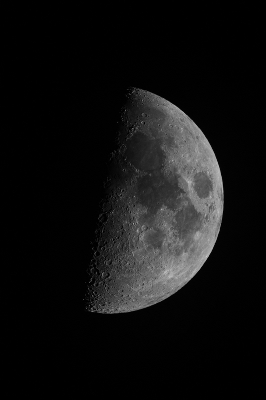 Half-Illuminated Moon With Crater Detail