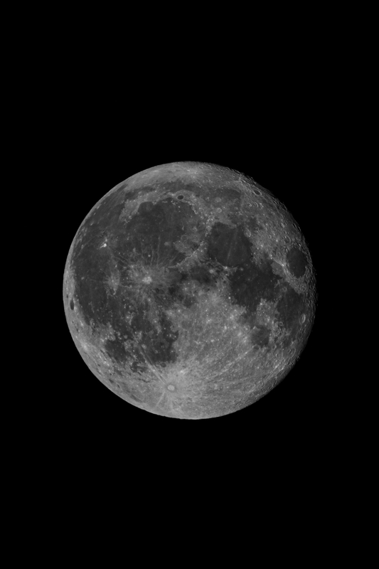 Detailed Full Moon Against Night Sky