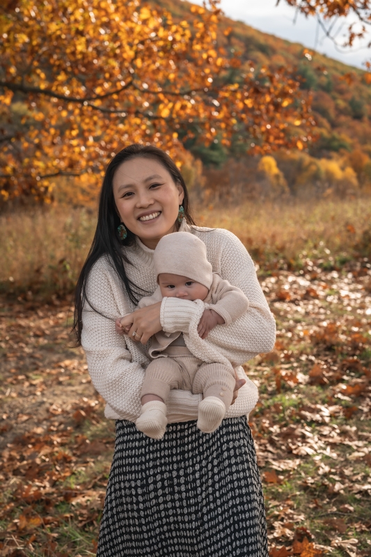 Mother and Infant in Autumn Foliage