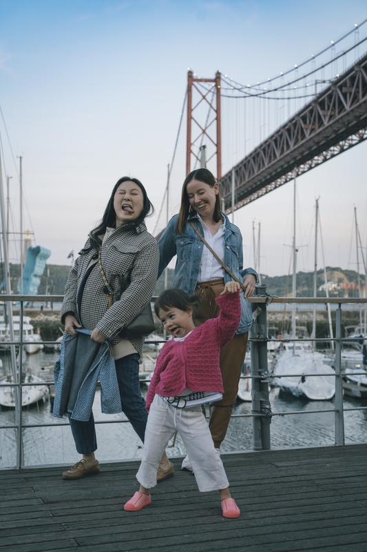 Family Portrait At Lisbon's Waterfront Bridge