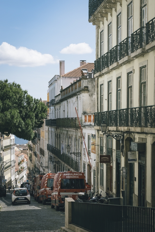 Historic Lisbon Street With Ambulance