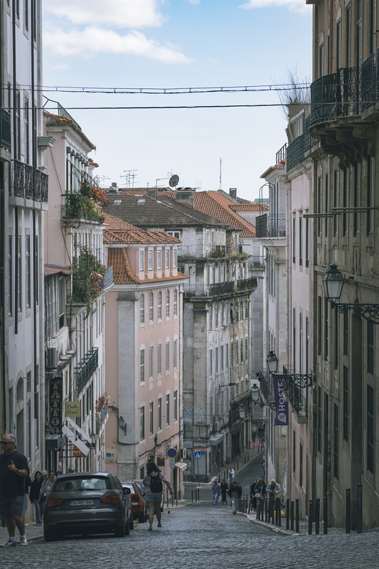Historic Lisbon Street With Terracotta Roofs