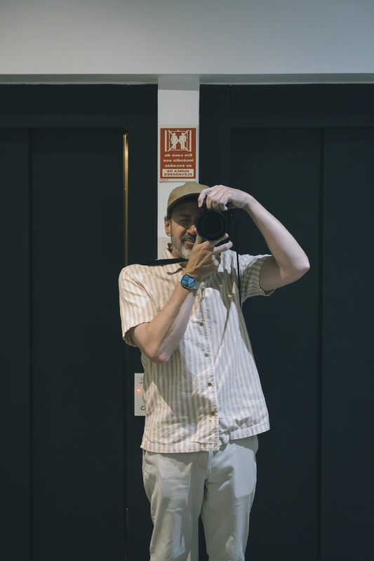 Self-Portrait Against Black Doors, Lisbon