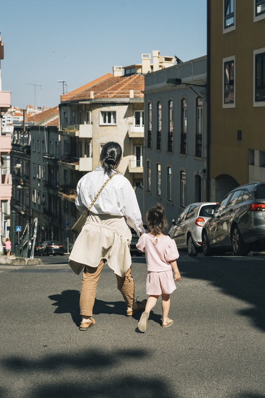 Jessica and Lulu Crossing a Lisbon Street