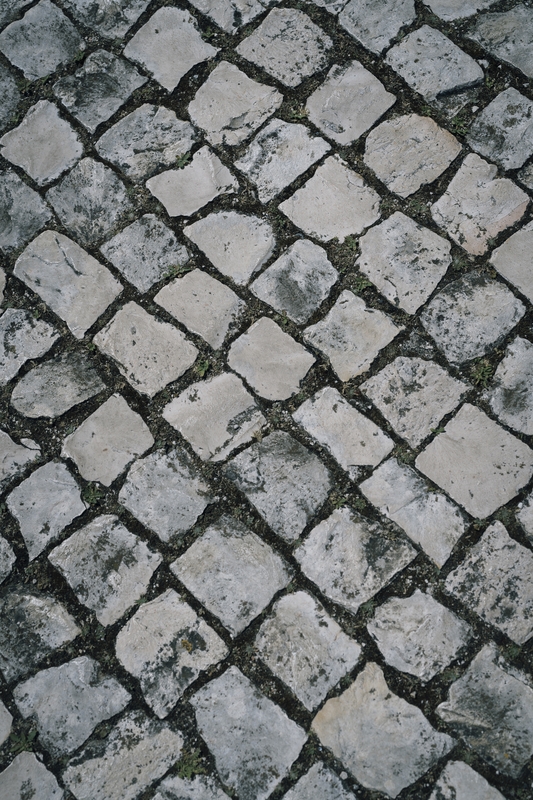 Weathered Cobblestone Street in Lisbon