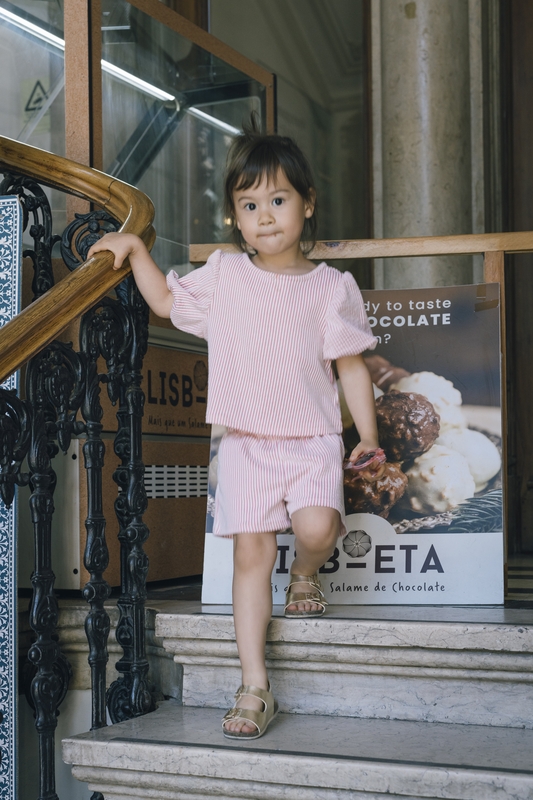 Lulu on the Chocolate Shop Steps